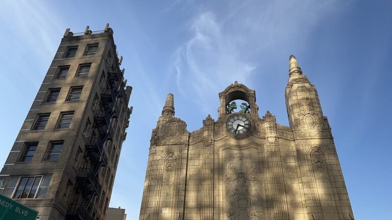 The Loew's Jersey Theatre facade and clock tower on Journal Square in Jersey City