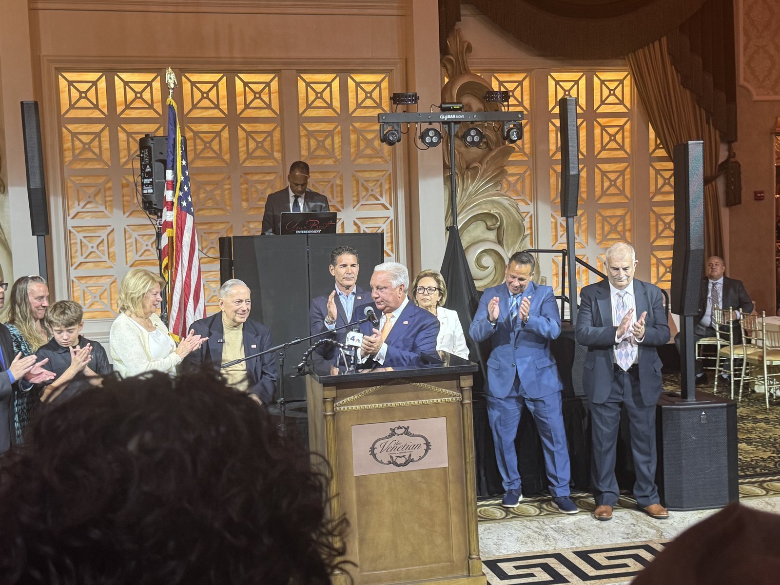 Supporters applaud on stage at the North Bergen Mayor's Ball