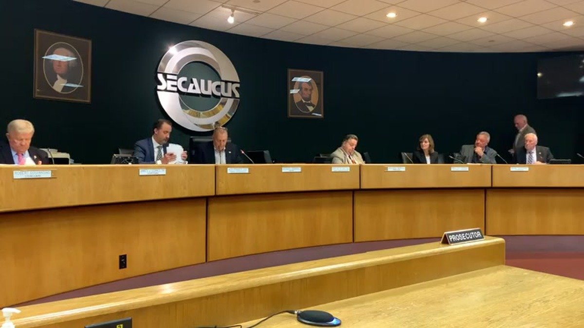 Secaucus Mayor Michael Gonnelli, Town Administrator Gary Jeffas, and Councilman Robert Costantino seated at the dais during the Oct. 27, 2026 Secaucus Town Council meeting